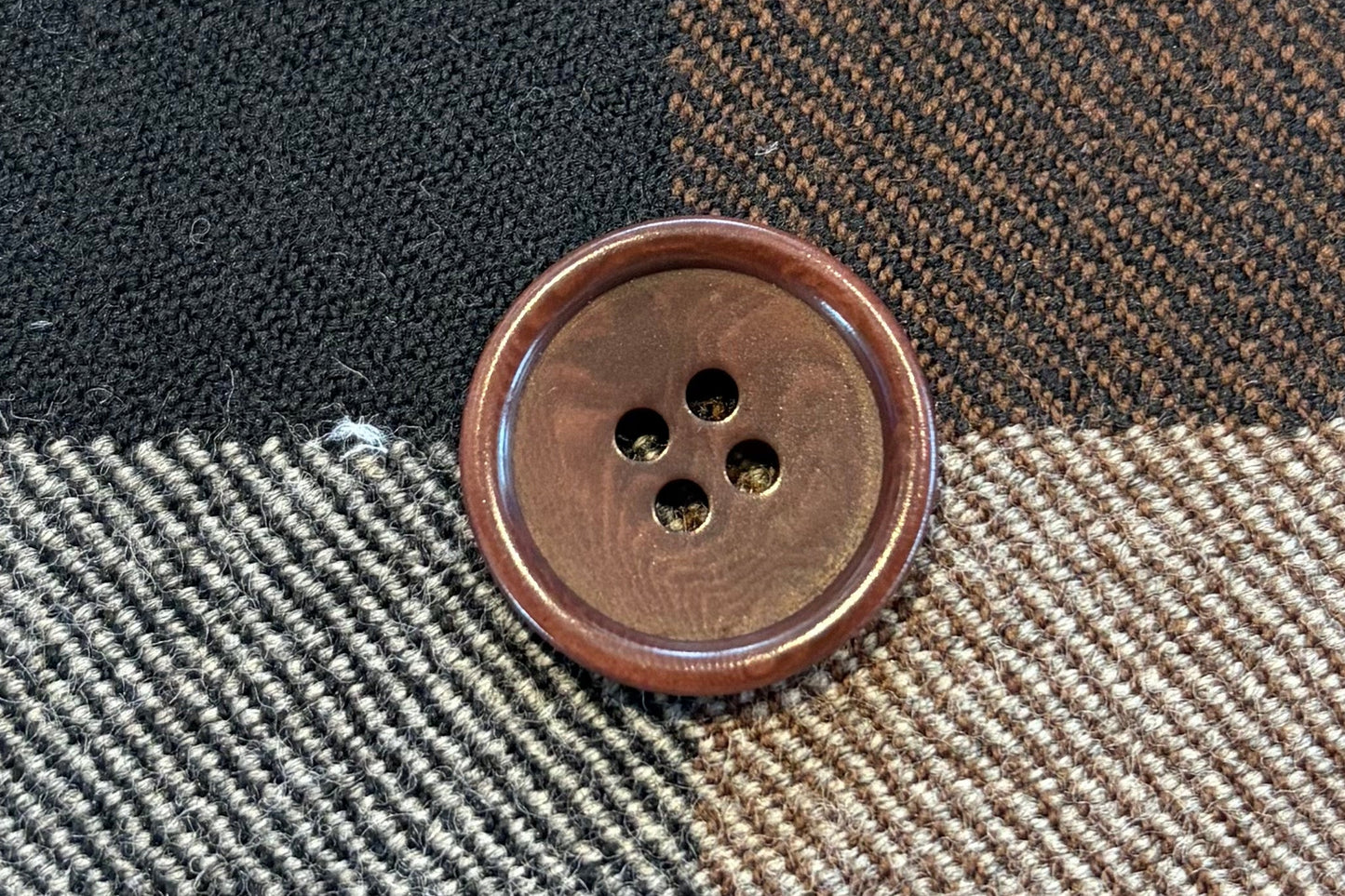 Plaid fabric with a button in the center